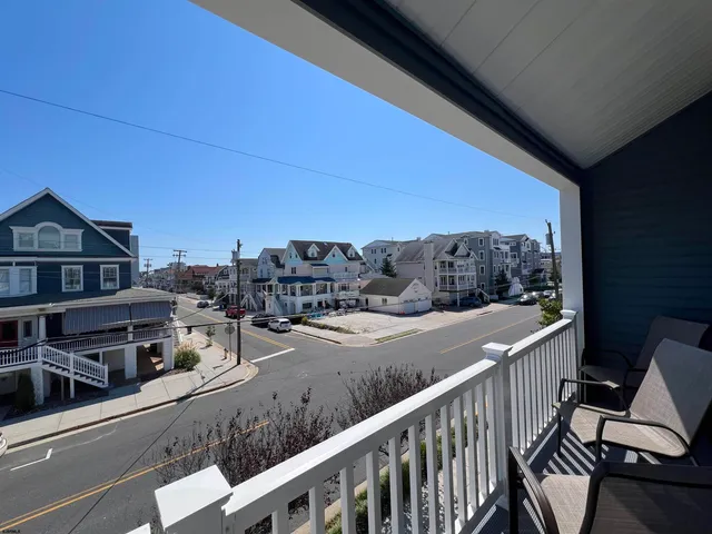 a view of a street with cars