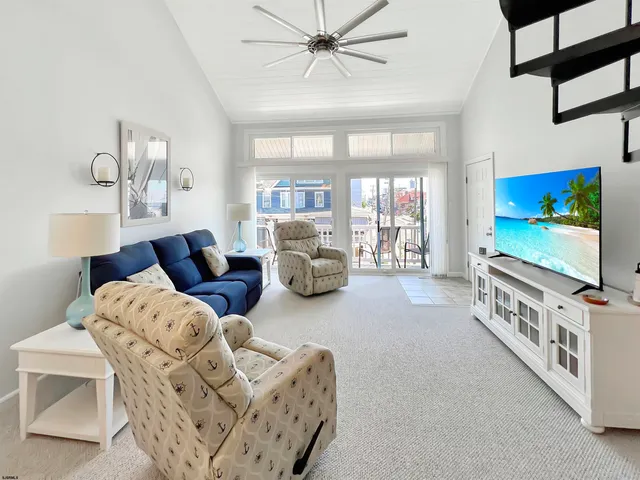 a kitchen with a dining table and chairs