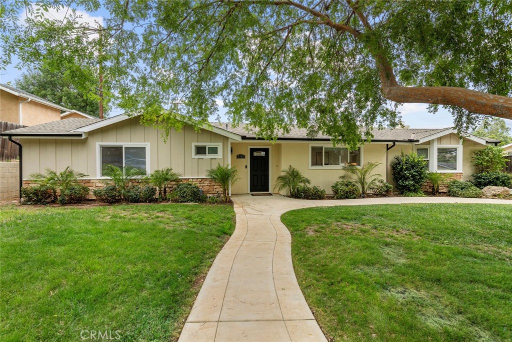 2162 Montgomery Road Thousand Oaks, CA 91360 - Photo 2 of 26 a front view of a house with a garden
