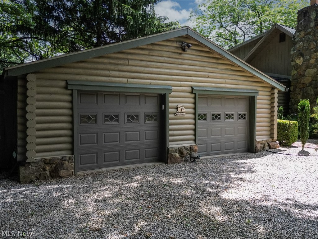 View of attached two car garage