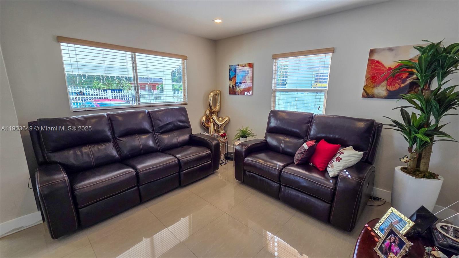 1545 Northwest 85th Street Miami, FL 33147 - Photo 4 of 16 a living room with furniture and a window