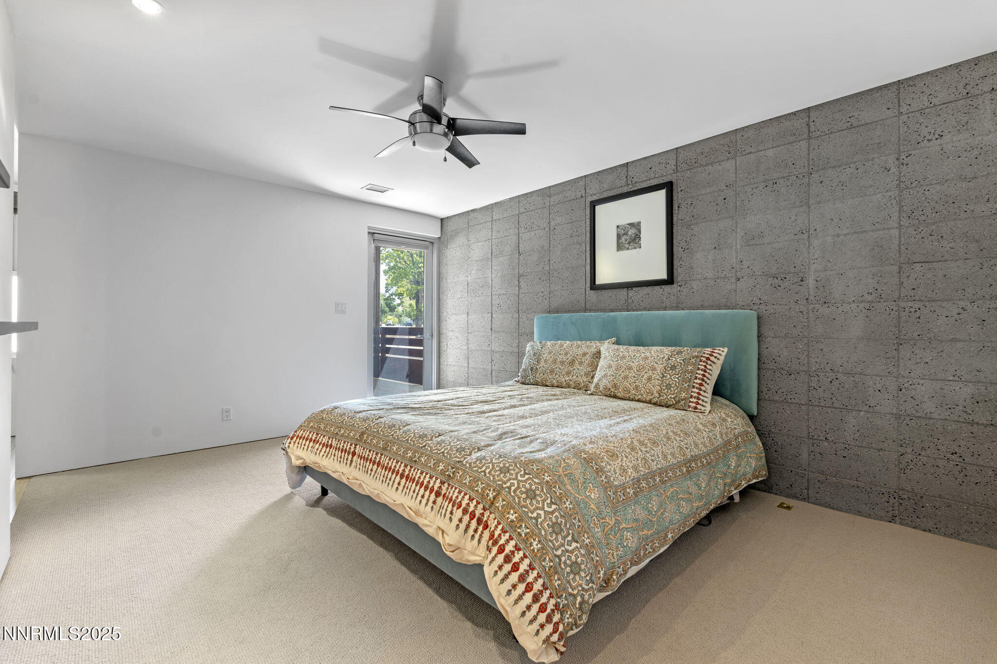 880 South Center Street Reno, NV 89501 - Photo 16 of 54 a bedroom with a bed and window