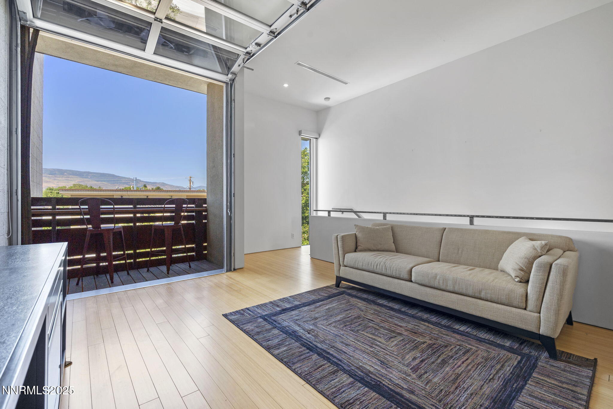 880 South Center Street Reno, NV 89501 - Photo 20 of 54 a living room with furniture and a flat screen tv