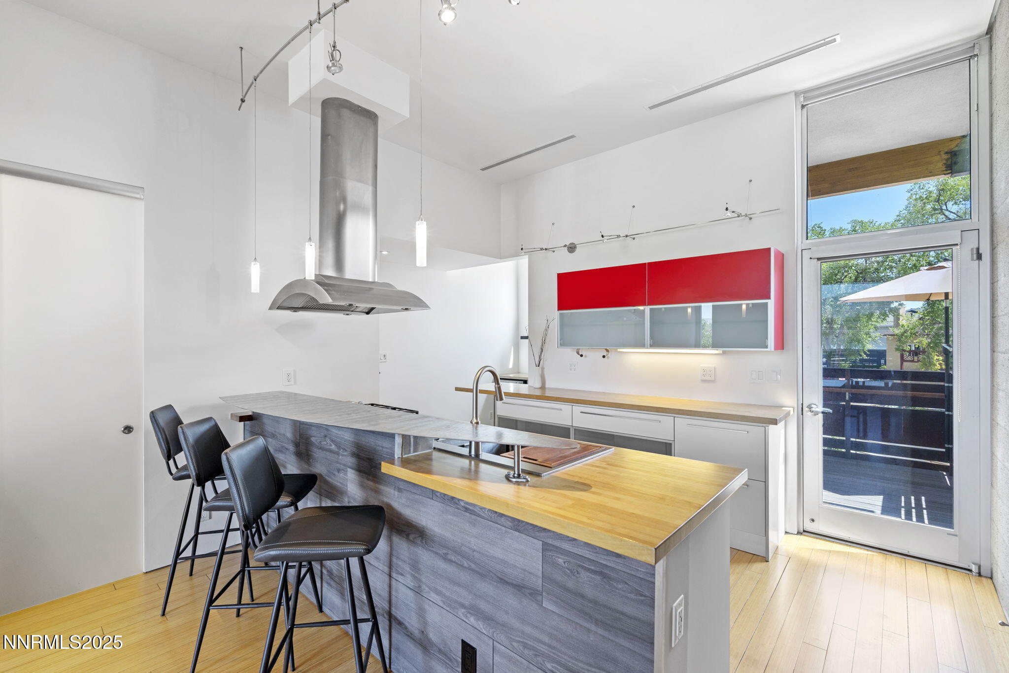 880 South Center Street Reno, NV 89501 - Photo 28 of 54 a kitchen with a stove a sink and a refrigerator