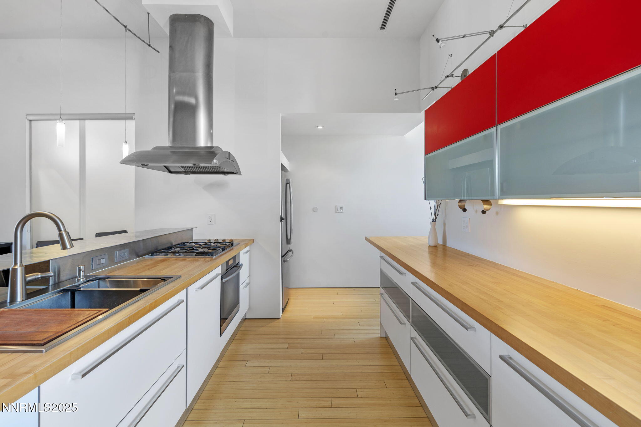 880 South Center Street Reno, NV 89501 - Photo 30 of 54 a kitchen with stainless steel appliances granite countertop a sink and a refrigerator