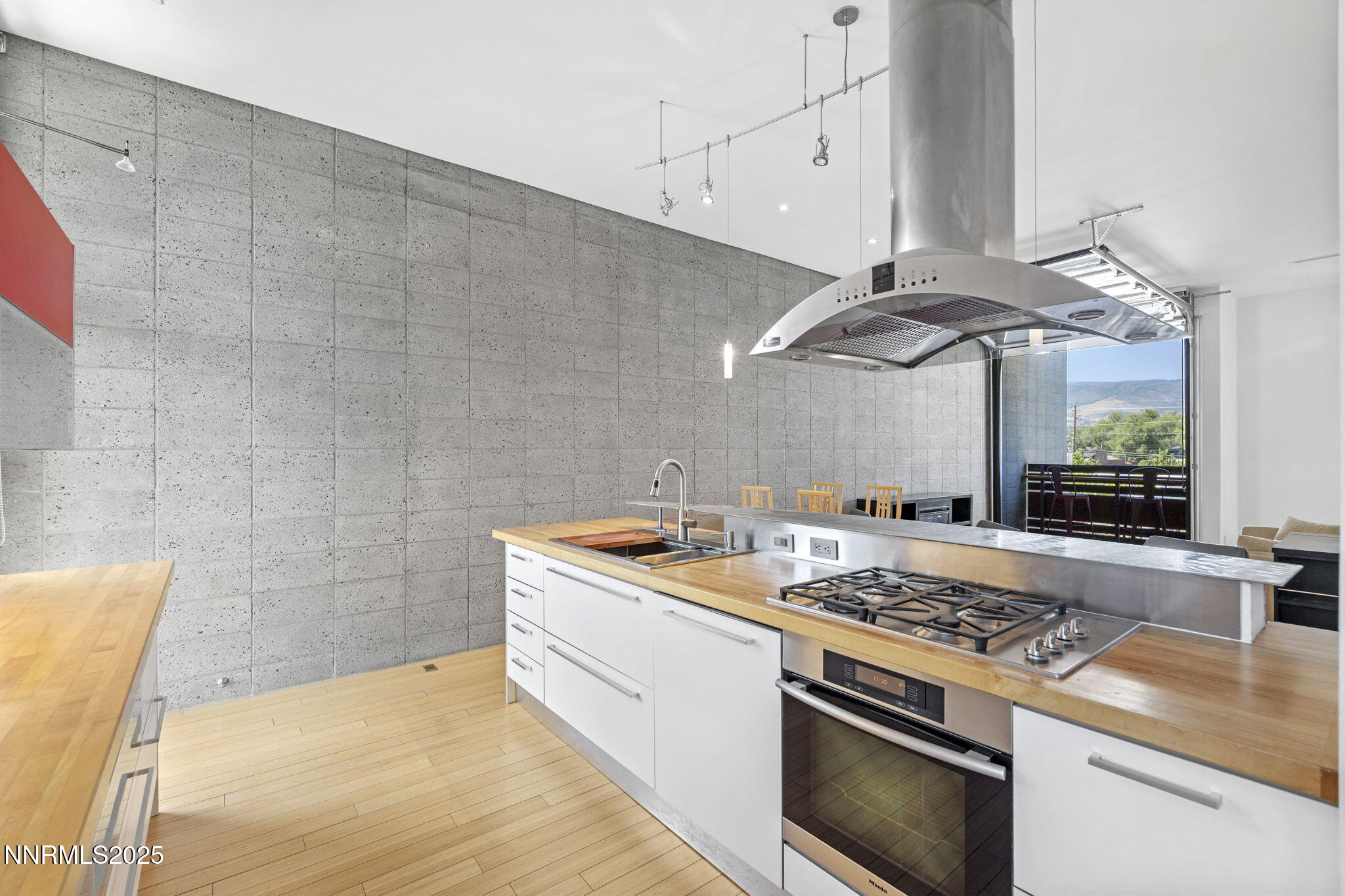 880 South Center Street Reno, NV 89501 - Photo 31 of 54 a kitchen with a stove and a sink