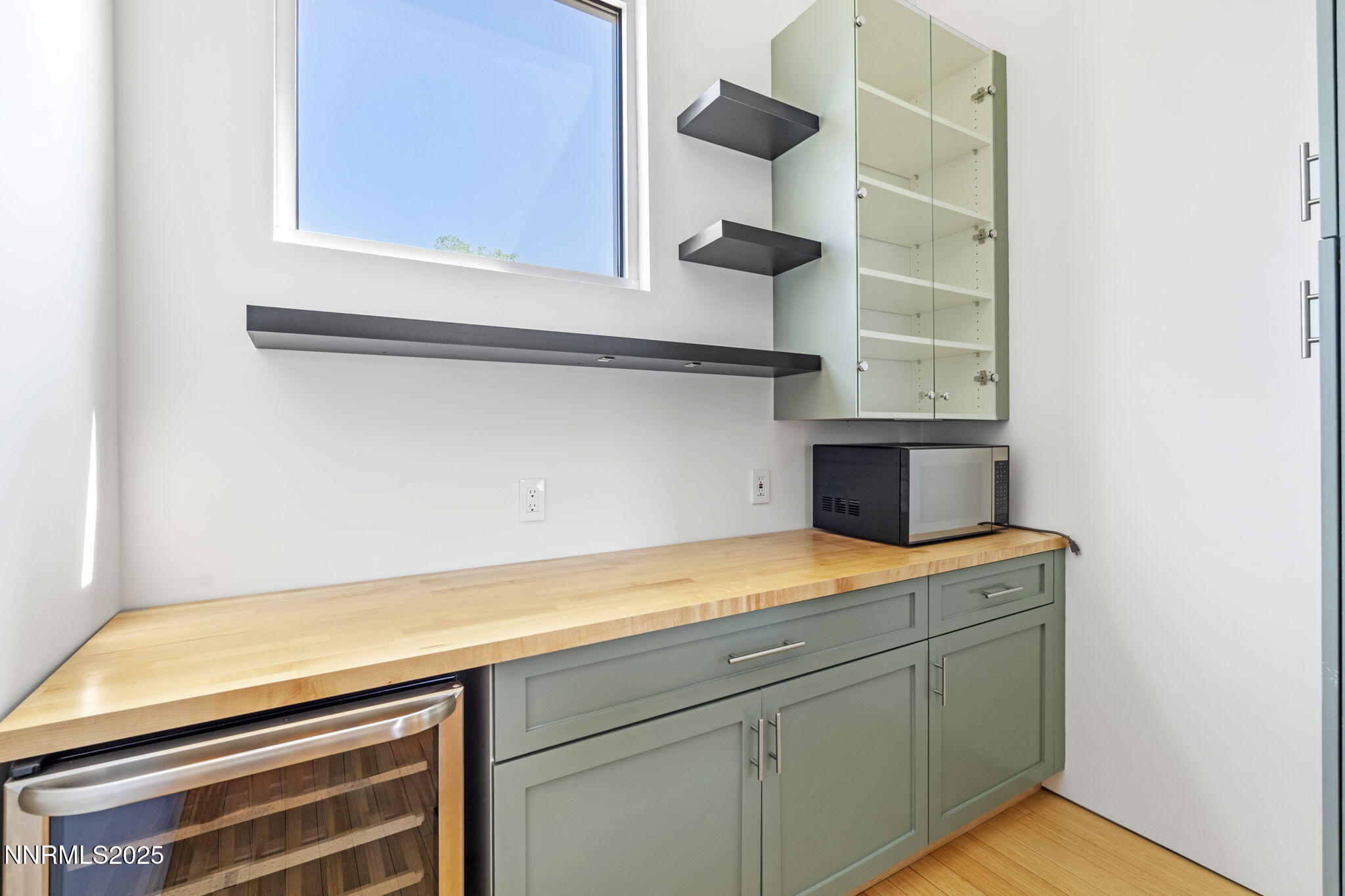 880 South Center Street Reno, NV 89501 - Photo 33 of 54 a view of storage and utility room with a cabinet and a lamp