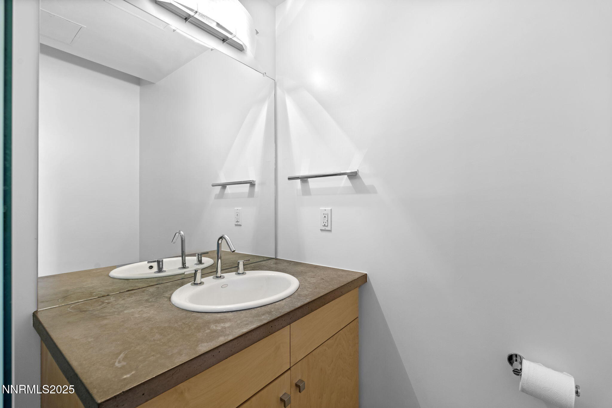 880 South Center Street Reno, NV 89501 - Photo 34 of 54 a bathroom with a sink and a mirror