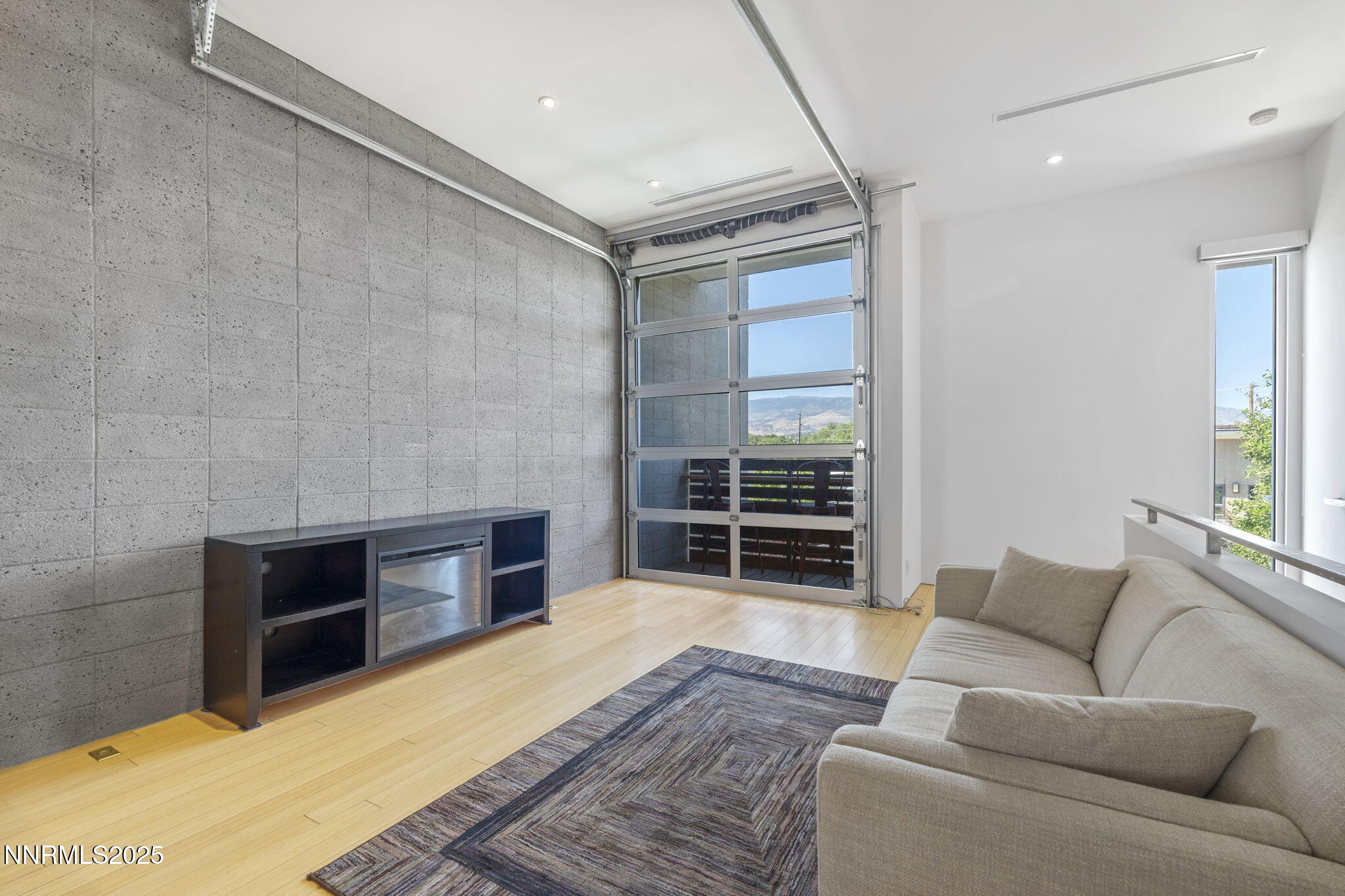 880 South Center Street Reno, NV 89501 - Photo 41 of 54 a living room with furniture and wooden floor