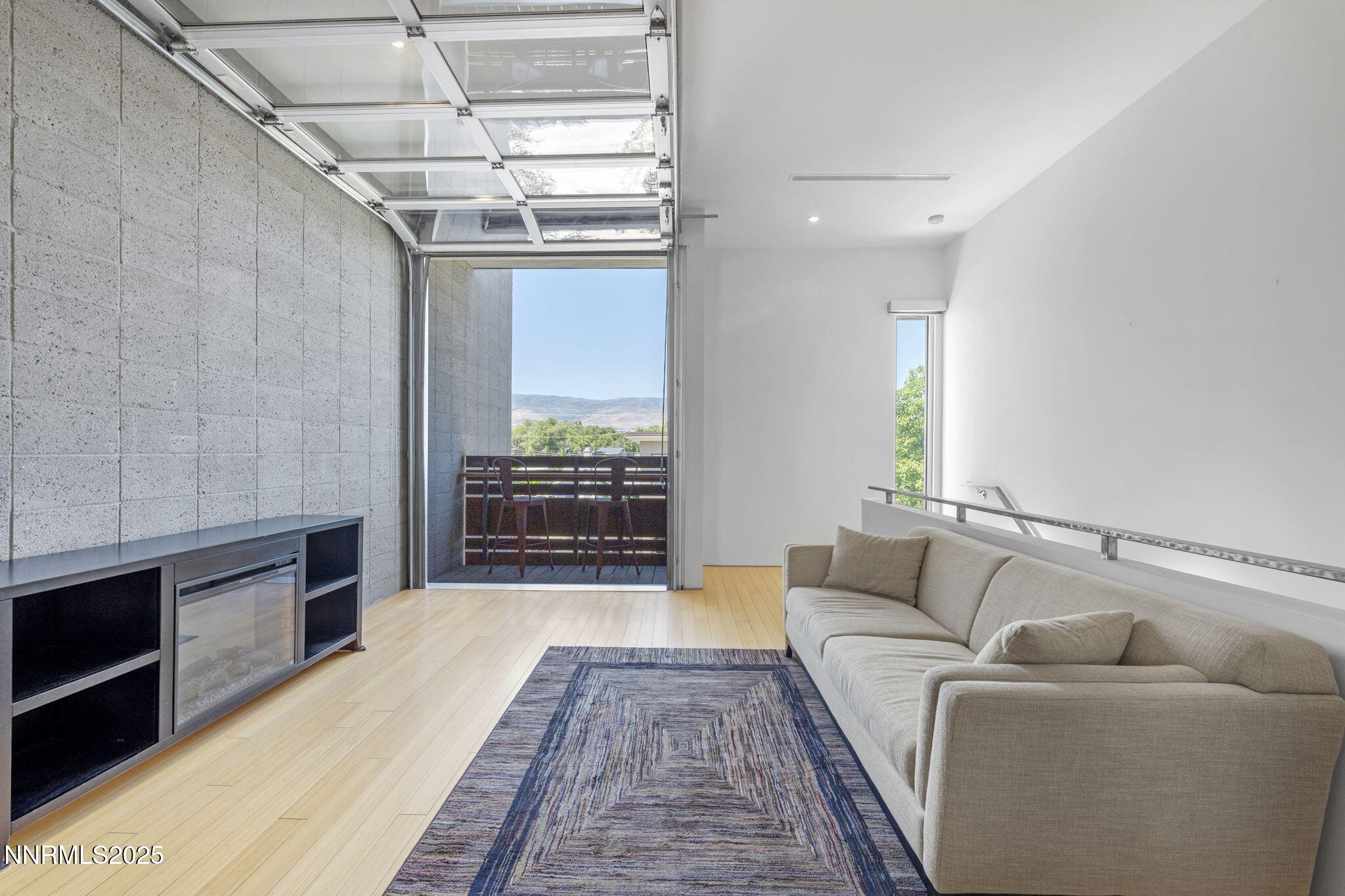 880 South Center Street Reno, NV 89501 - Photo 42 of 54 a living room with furniture and a rug