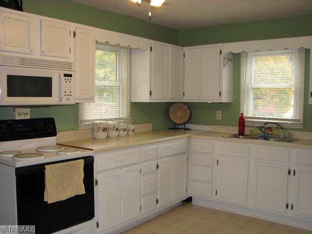 211 East Springfield Road High Point, NC 27263 - Photo 7 of 15 Kitchen. The kitchen is very spacious, and has been nicely updated!