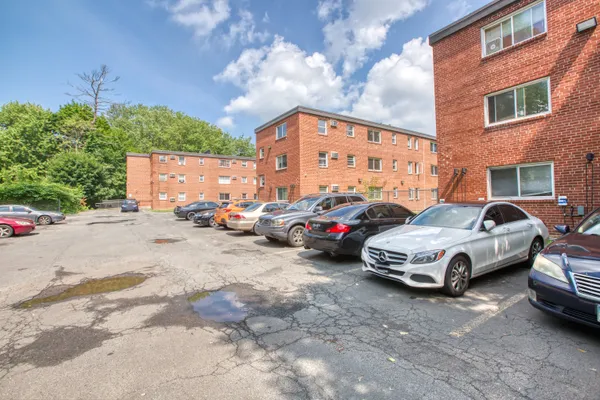 a car parked in front of a building