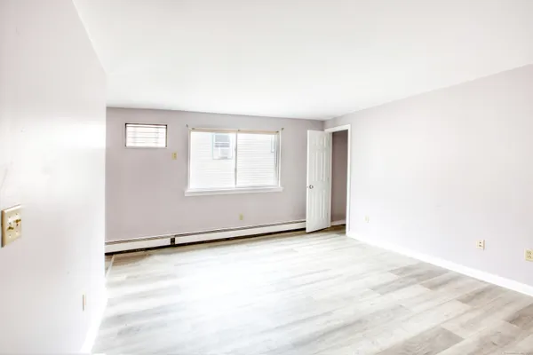 an empty room with window