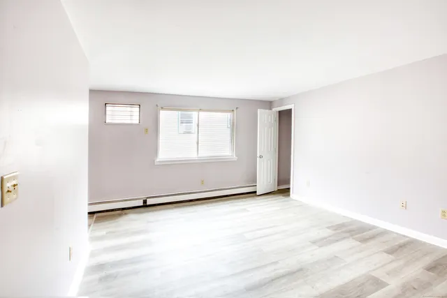 an empty room with window