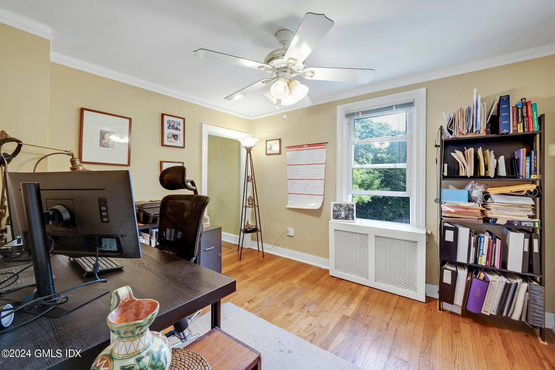 334 Palmer Hill Road Riverside, CT 06878 - Photo 14 of 19 a living room with lots of furniture and a book shelf