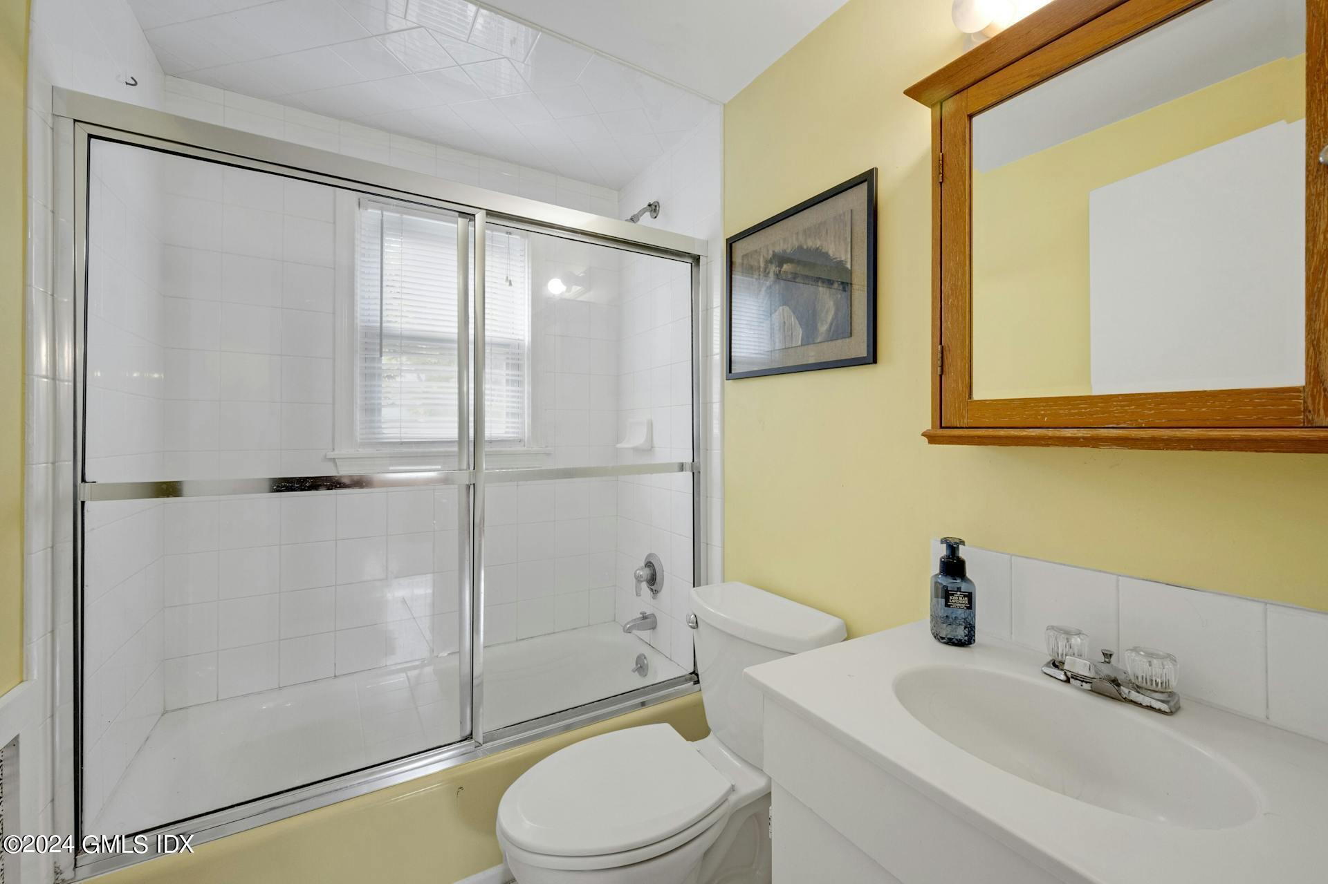 334 Palmer Hill Road Riverside, CT 06878 - Photo 15 of 19 a bathroom with a sink toilet and shower
