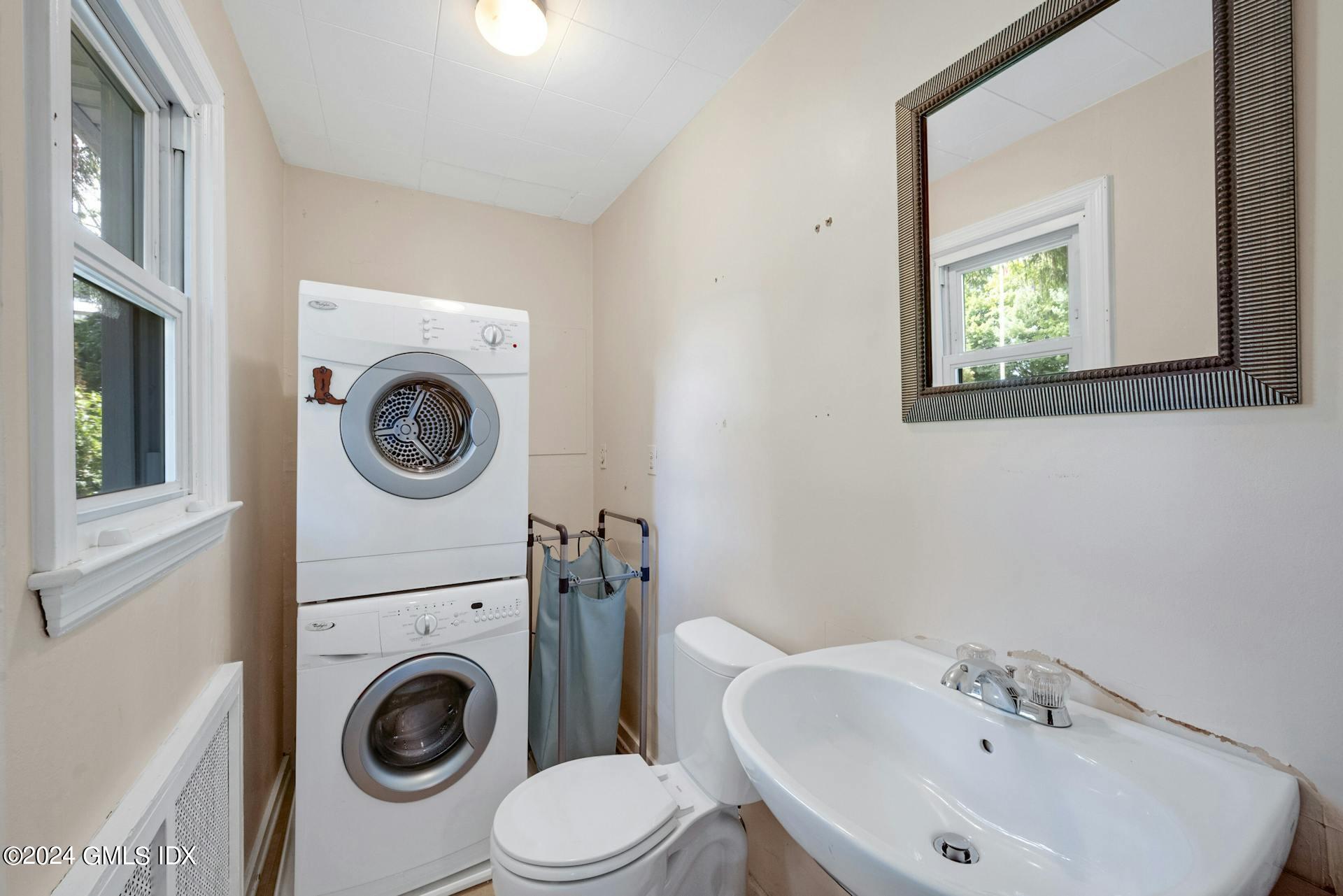 334 Palmer Hill Road Riverside, CT 06878 - Photo 16 of 19 a bathroom with a sink and a toilet