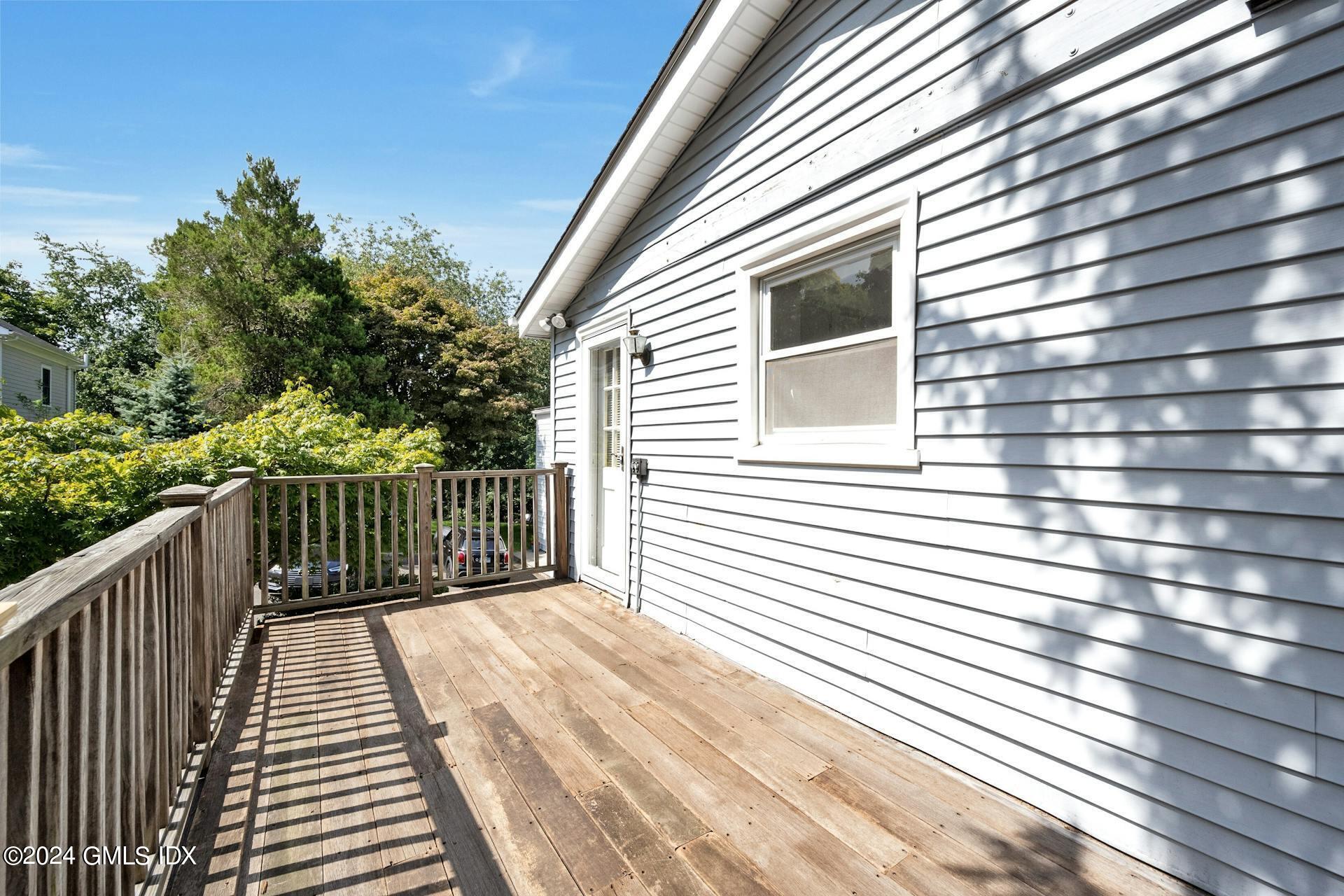 334 Palmer Hill Road Riverside, CT 06878 - Photo 18 of 19 a view of a balcony with wooden floor