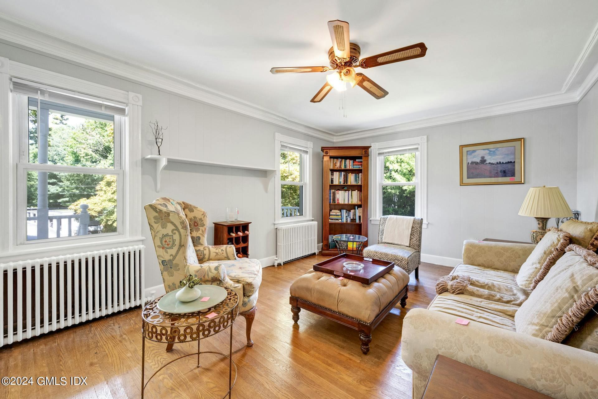 334 Palmer Hill Road Riverside, CT 06878 - Photo 2 of 19 a living room with furniture and a window