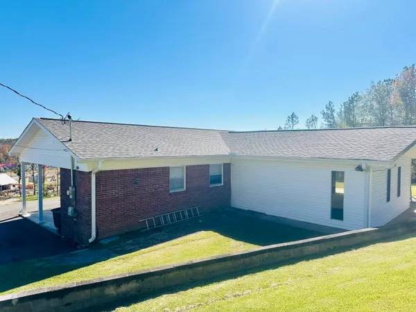 a view of backyard with a tv