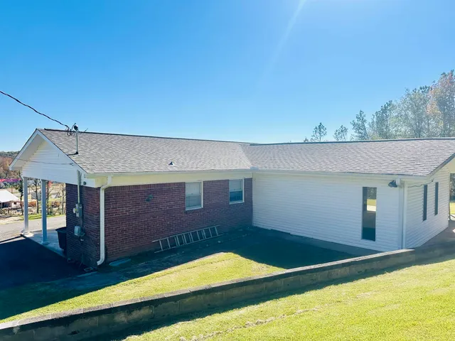 a view of backyard with a tv
