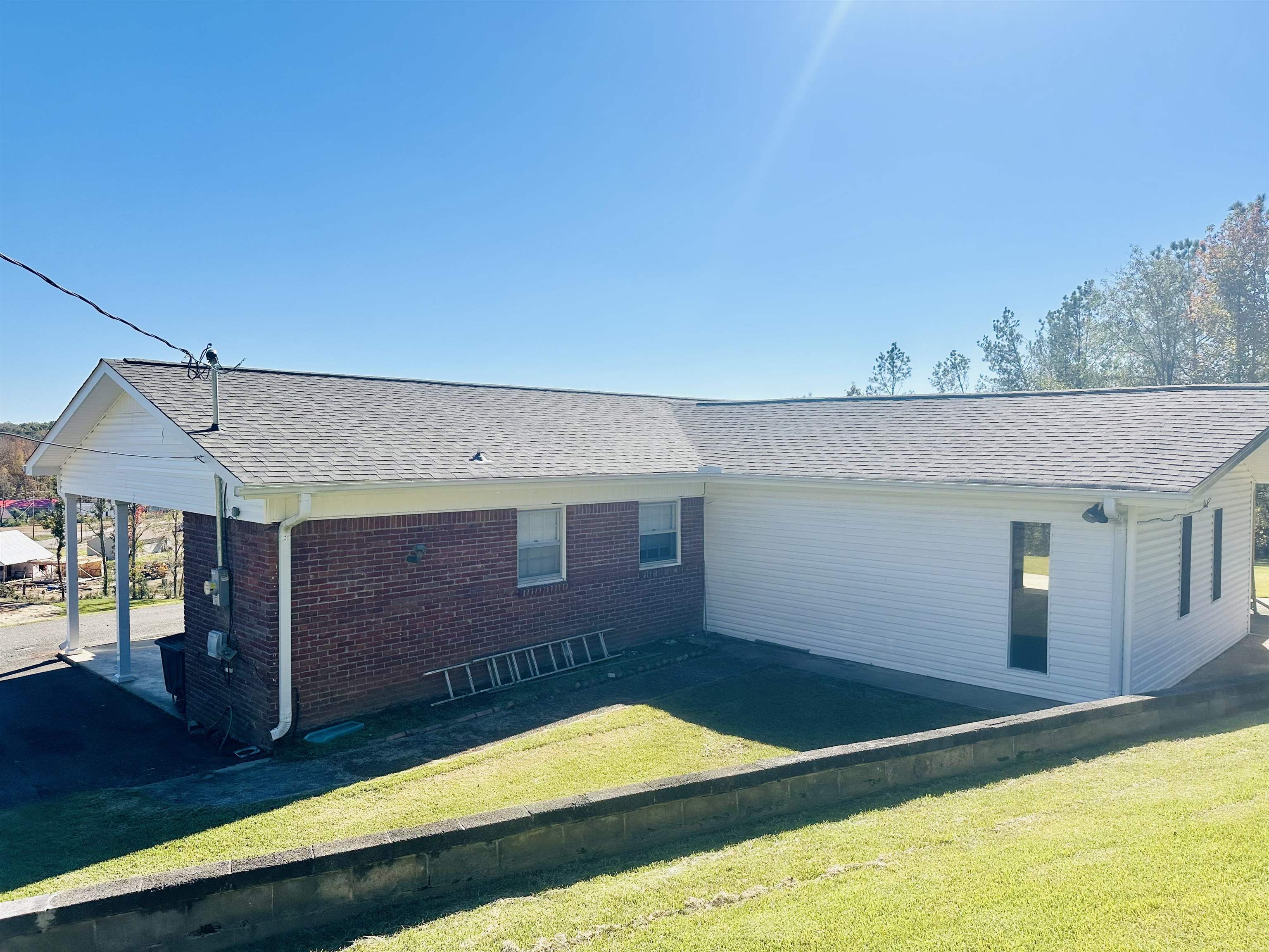136 Perkins Street Selmer, TN 38375 - Photo 20 of 25 a view of backyard with a tv