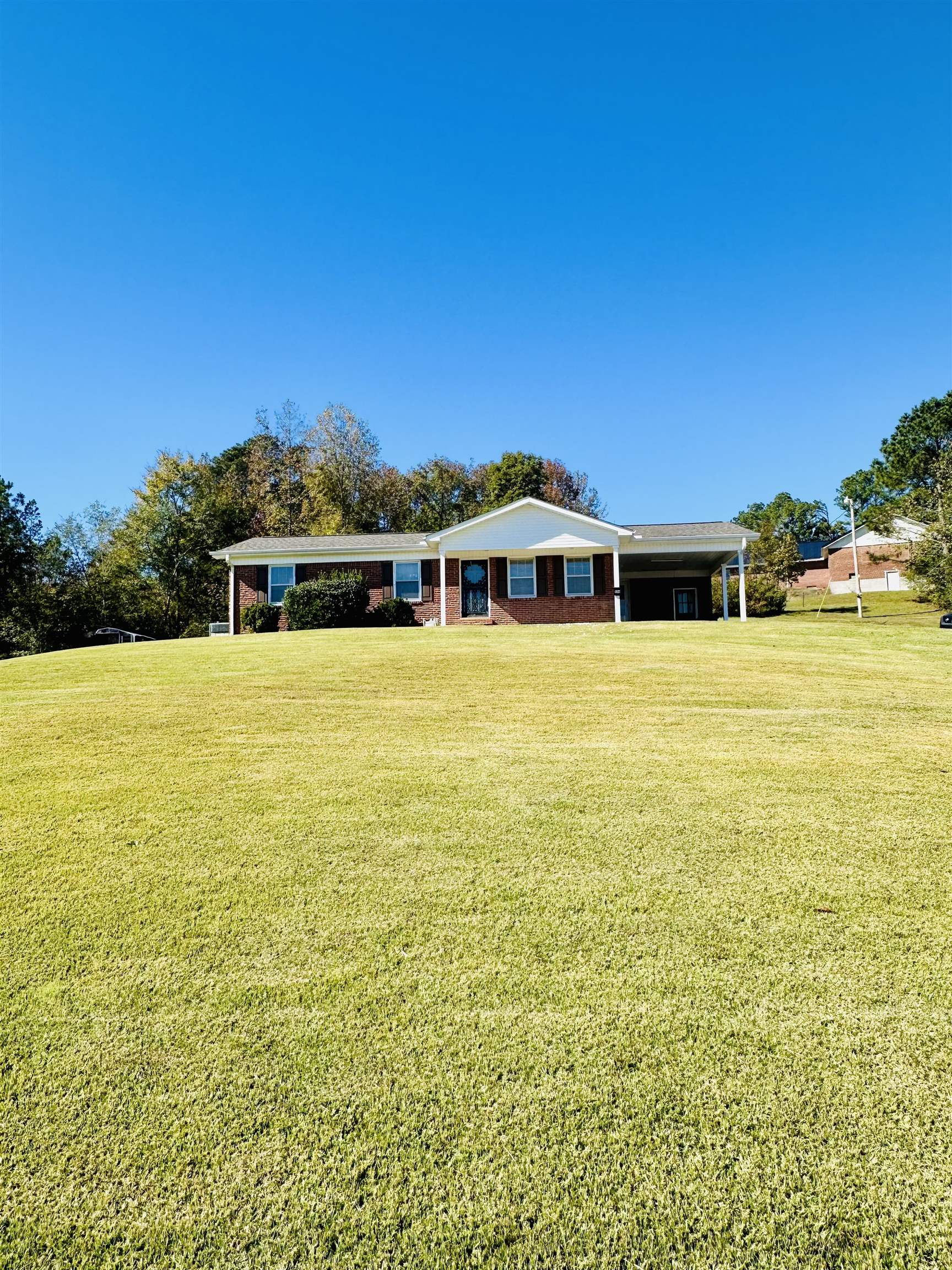136 Perkins Street Selmer, TN 38375 - Photo 25 of 25 a view of building with ocean view