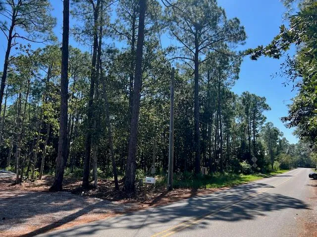 a view of a backyard of a house