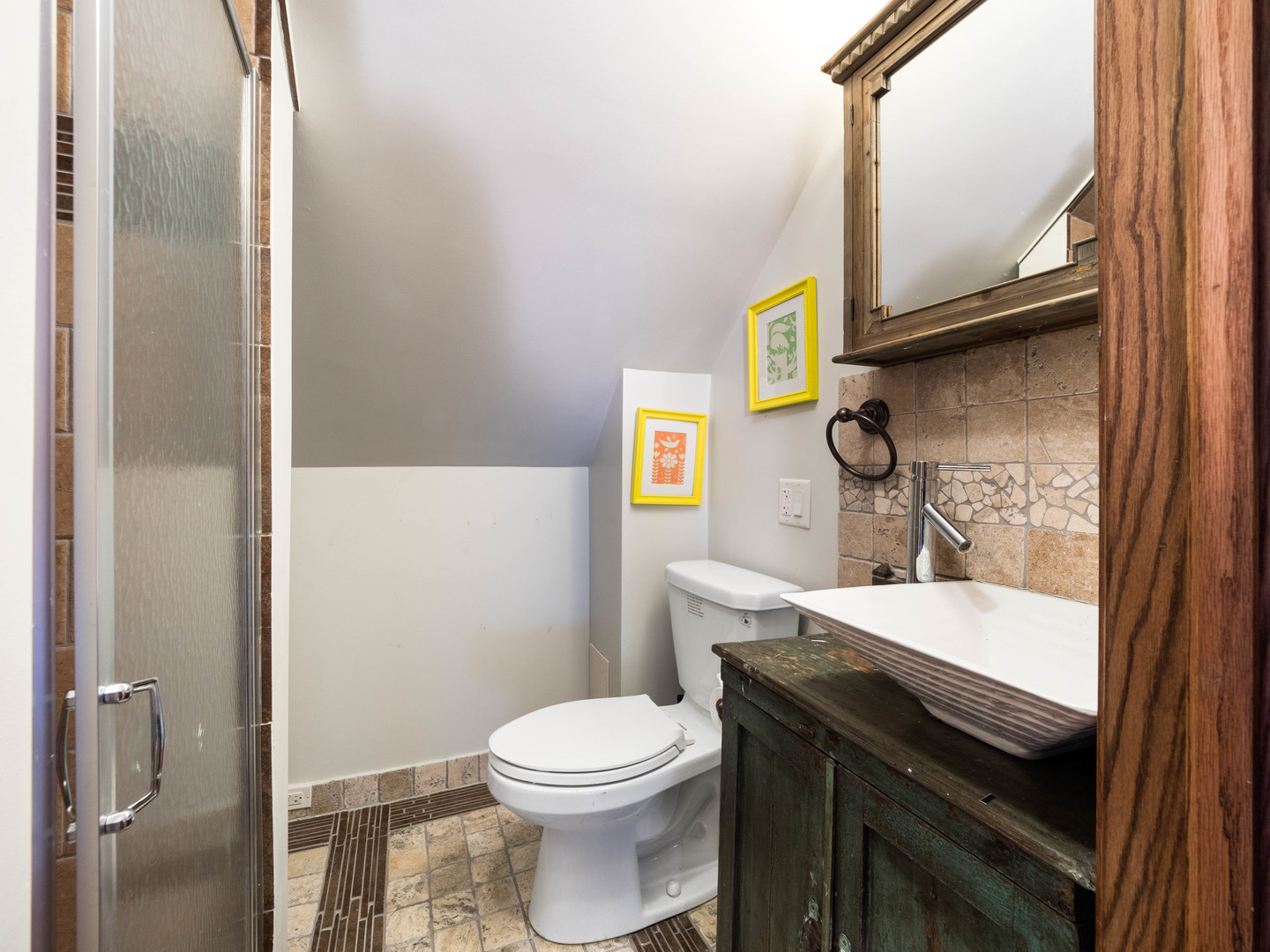 3306 North Nottingham Avenue Chicago, IL 60634 - Photo 13 of 25 a bathroom with a sink a toilet and a mirror