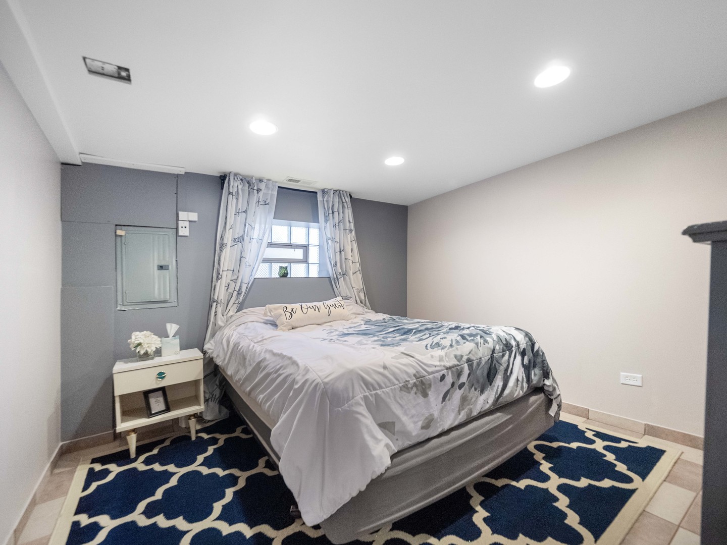 3306 North Nottingham Avenue Chicago, IL 60634 - Photo 17 of 25 a bedroom with a bed and a window
