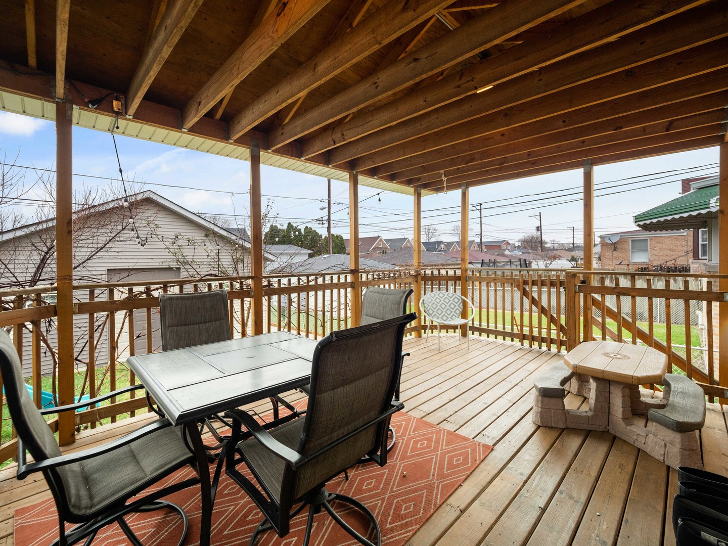 3306 North Nottingham Avenue Chicago, IL 60634 - Photo 23 of 25 a view of a balcony with furniture and wooden floor