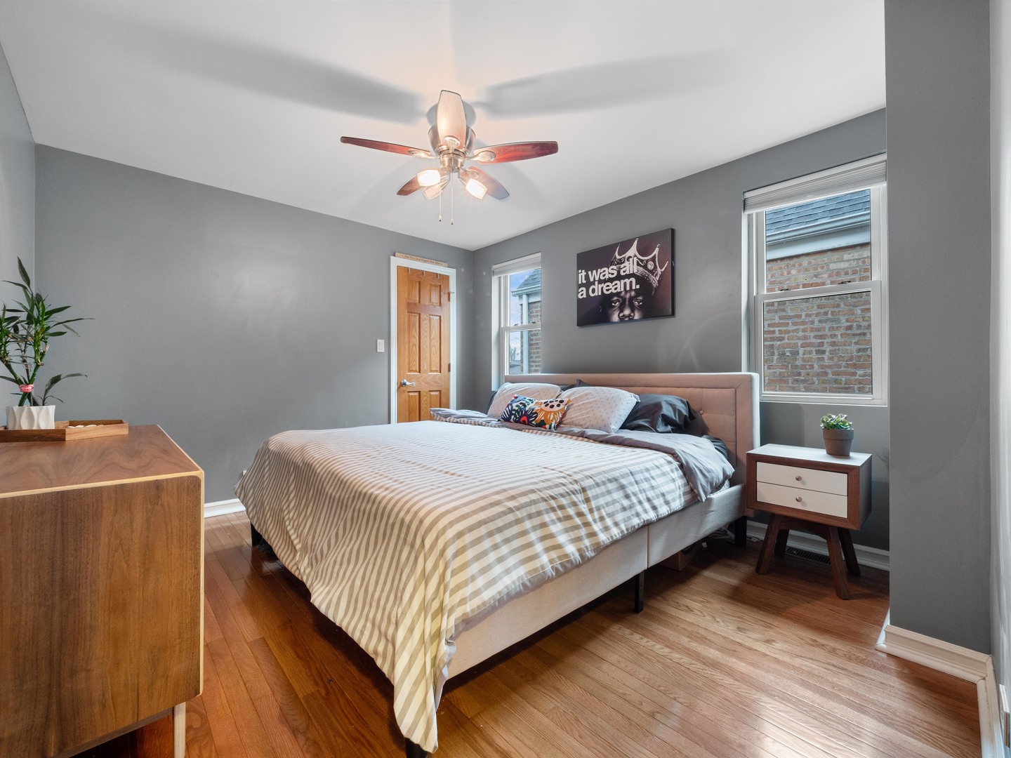 3306 North Nottingham Avenue Chicago, IL 60634 - Photo 6 of 25 a bedroom with a large bed and a window