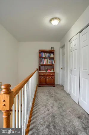 a view of a hallway with closet
