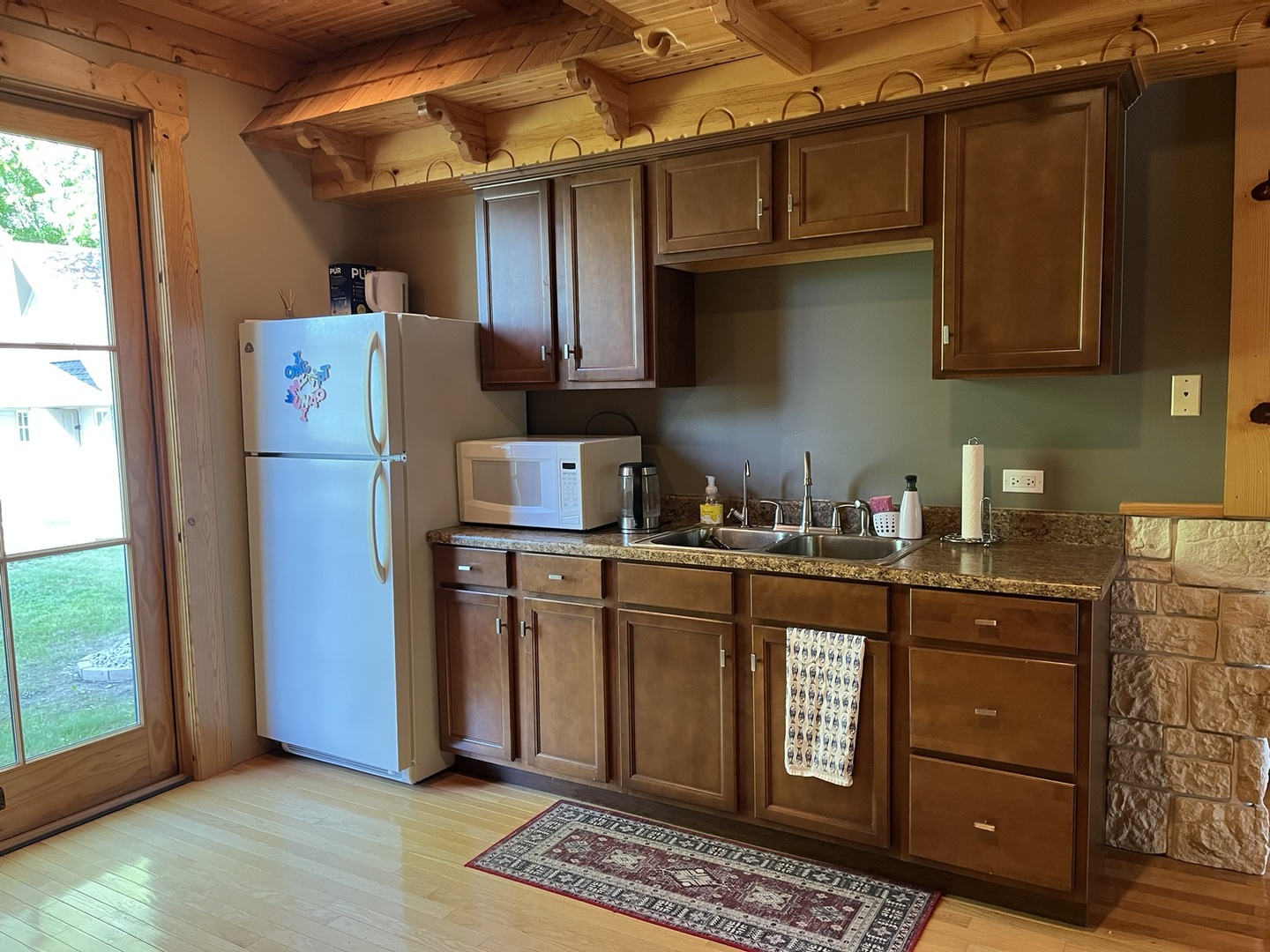 423 Mallard Point Drive Danville, IL 61834 - Photo 11 of 40 a kitchen with stainless steel appliances granite countertop a refrigerator and a sink