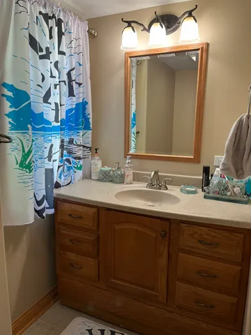 a bathroom with a toilet and a sink