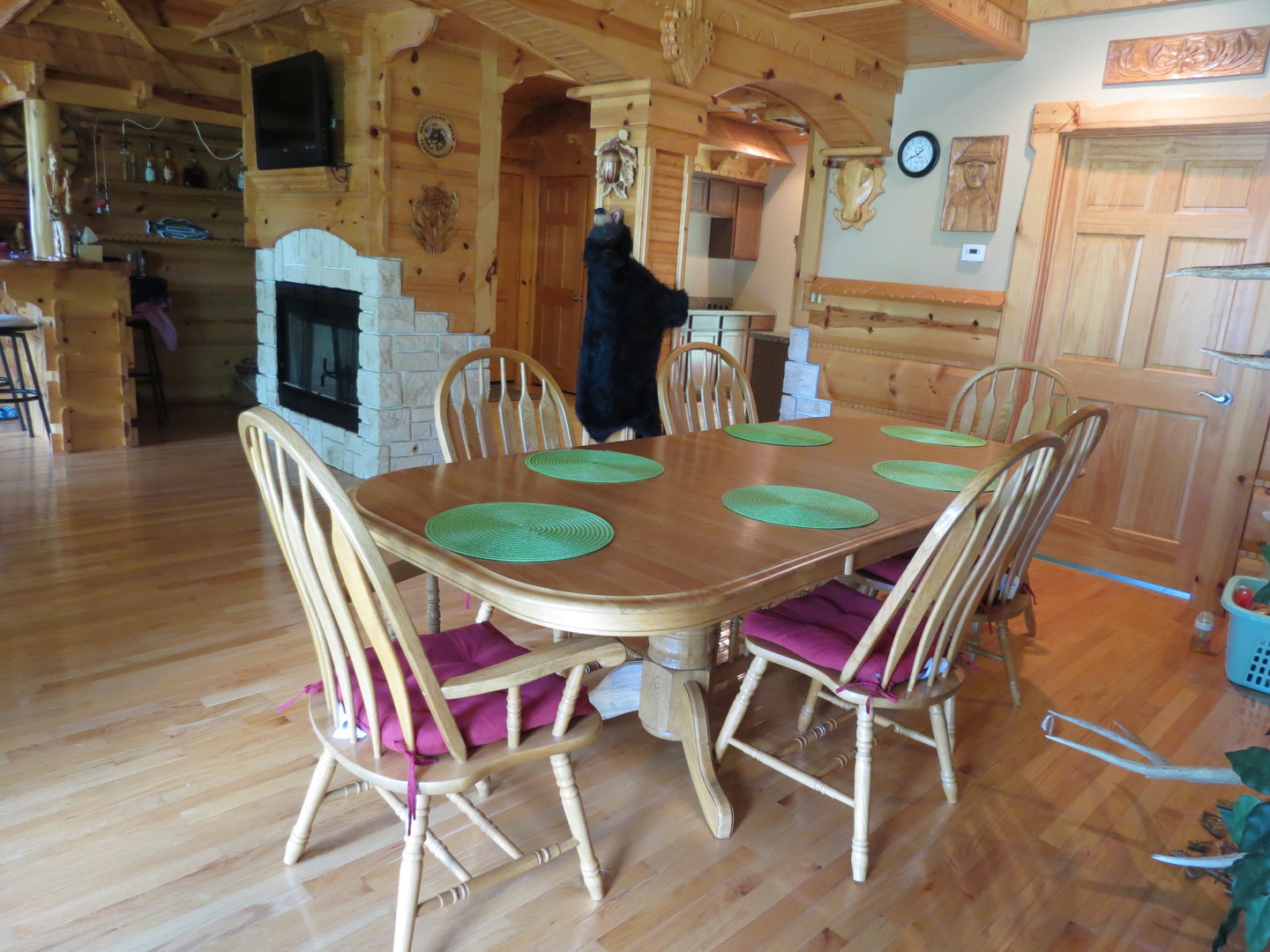 423 Mallard Point Drive Danville, IL 61834 - Photo 8 of 40 a dining room with furniture a fireplace and wooden floor