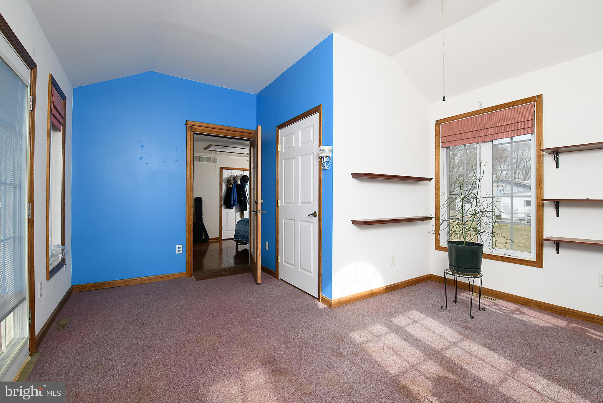 1024 Fence Post Lane Viola, DE 19979 - Photo 34 of 47 a view of empty room with wooden floor and fan