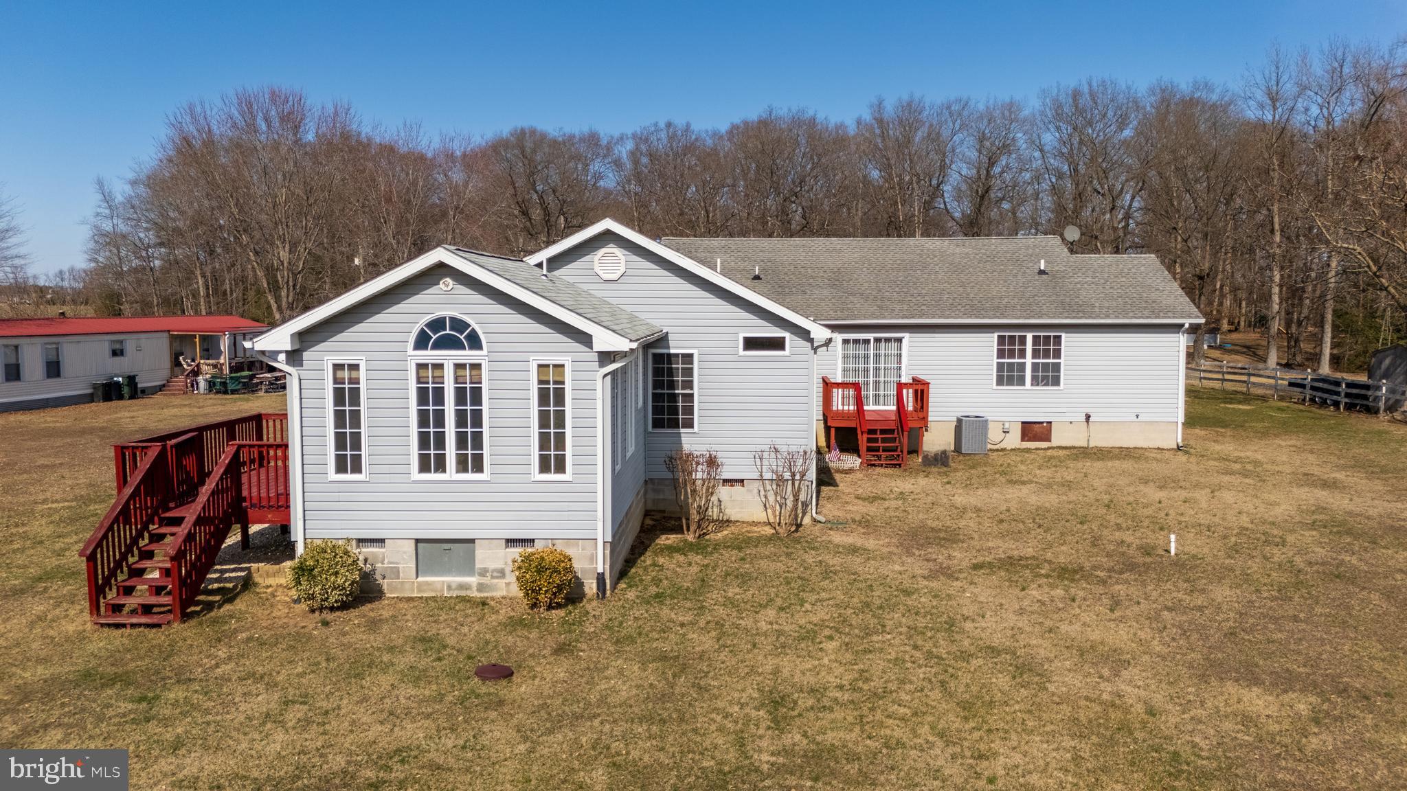 1024 Fence Post Lane Viola, DE 19979 - Photo 4 of 47 a view of a house with a yard and garage