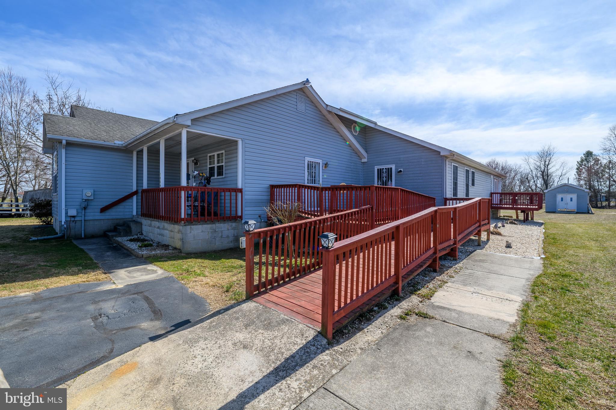 1024 Fence Post Lane Viola, DE 19979 - Photo 5 of 47 a view of a house with backyard and porch
