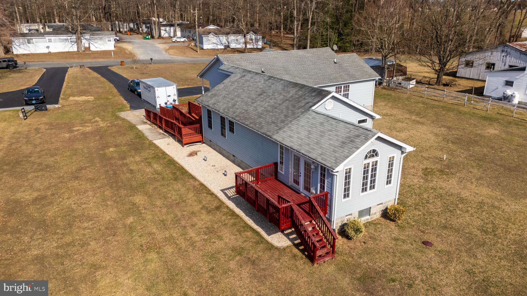 1024 Fence Post Lane Viola, DE 19979 - Photo 8 of 47 an aerial view of a house with swimming pool and porch