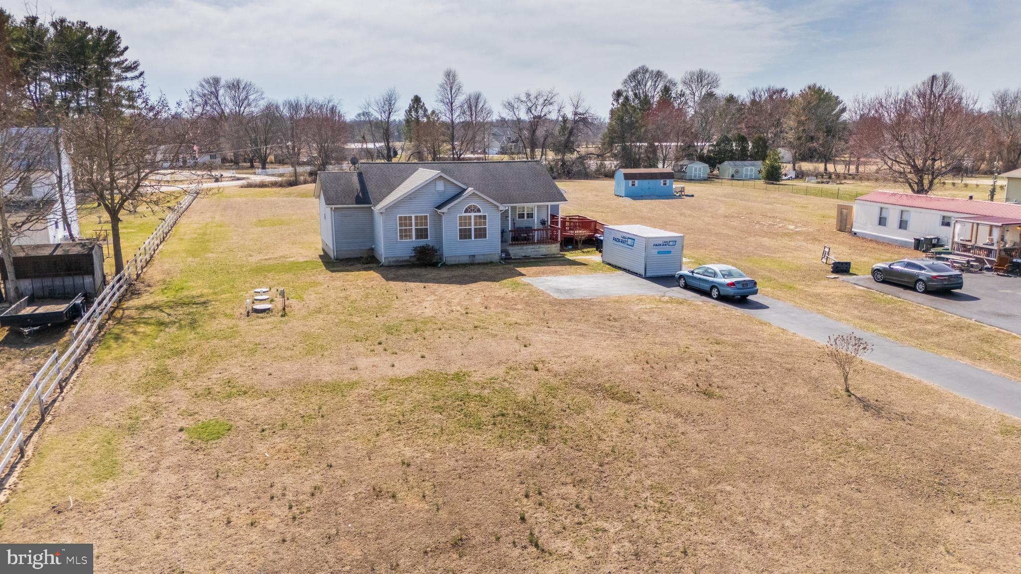 1024 Fence Post Lane Viola, DE 19979 - Photo 10 of 47 a street view with tall buildings and ocean view