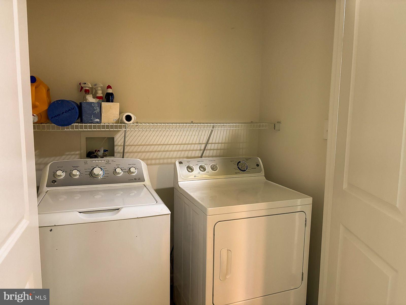 63 Franklin Circle, Unit 63 Somerdale, NJ 08083 - Photo 15 of 18 a utility room with dryer and washer