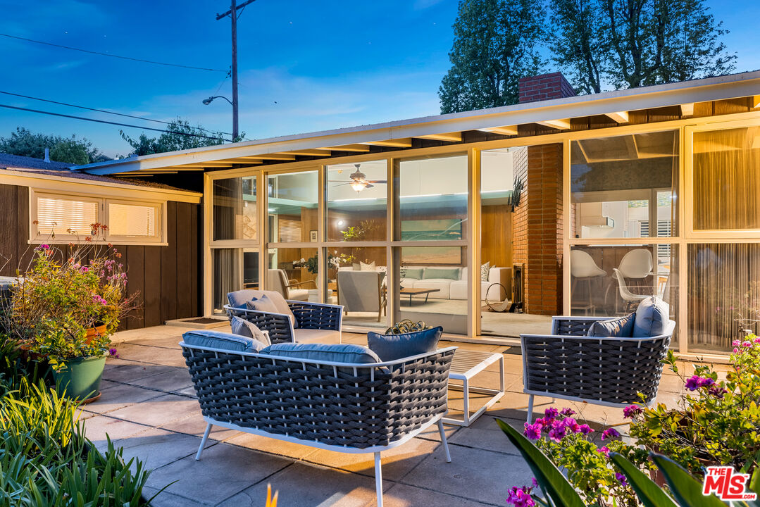 11368 Berwick Street Los Angeles, CA 90049 - Photo 26 of 31 a outdoor space with patio the couches and potted plants