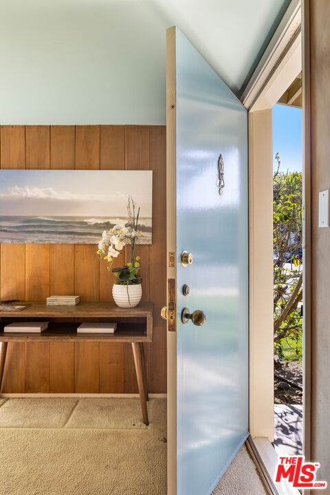 11368 Berwick Street Los Angeles, CA 90049 - Photo 3 of 31 a bathroom with a bathtub and shower