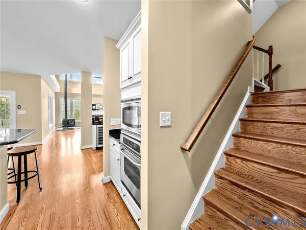 a view of a patio with a table and chairs