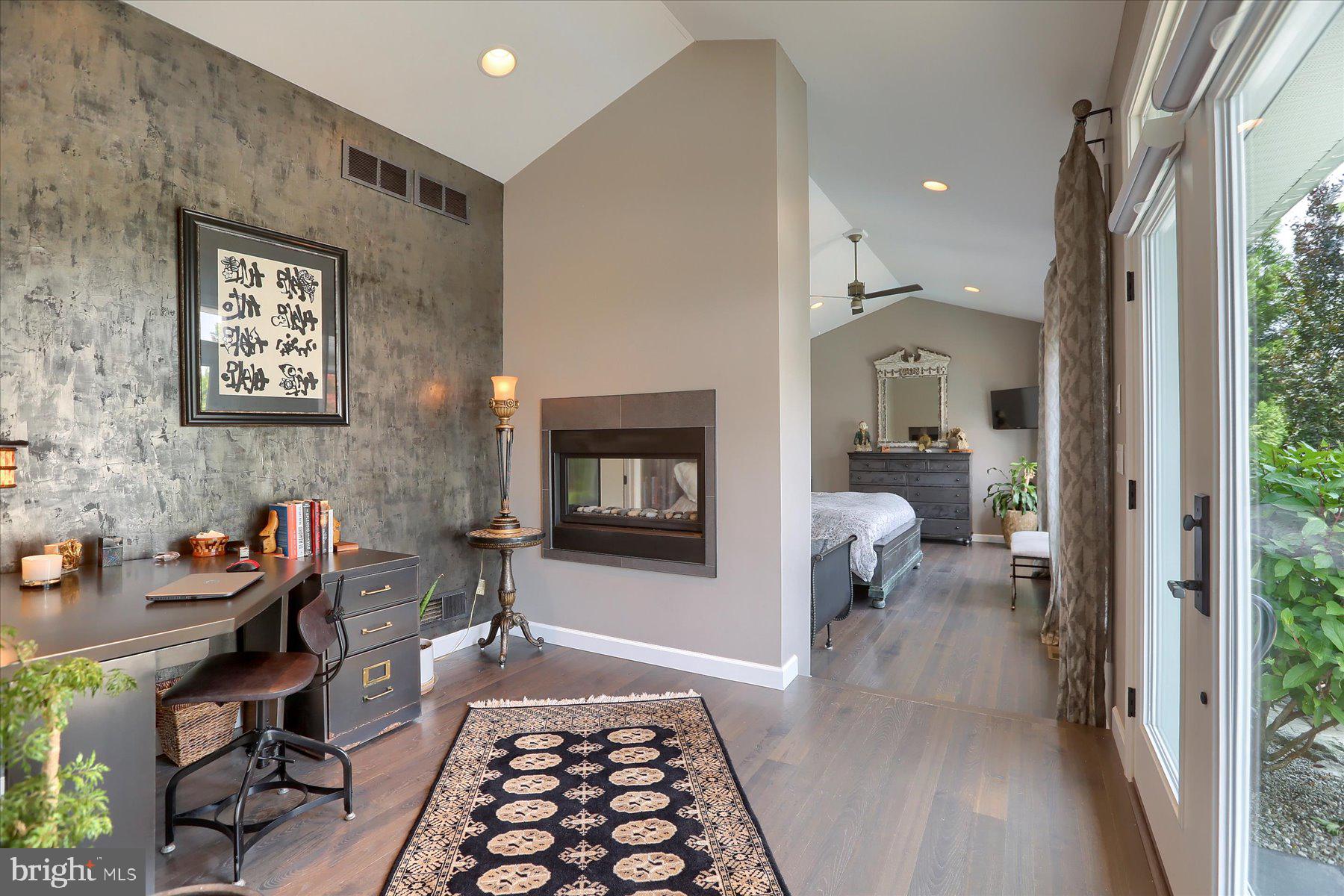 503 Maple Avenue Hershey, PA 17033 - Photo 16 of 43 a hallway with a dining table and a stove