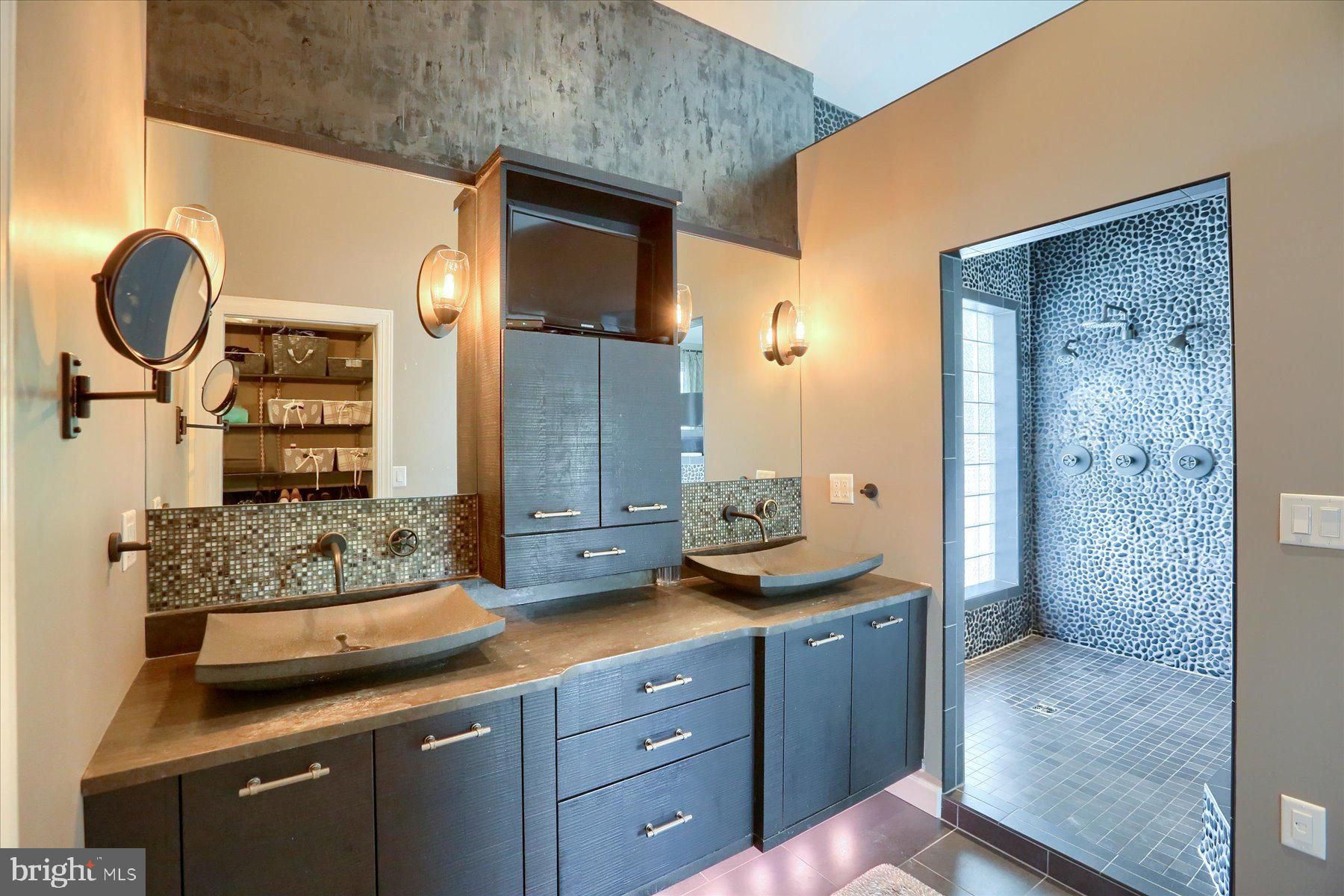 503 Maple Avenue Hershey, PA 17033 - Photo 22 of 43 a bathroom with a granite countertop sink a mirror and shower