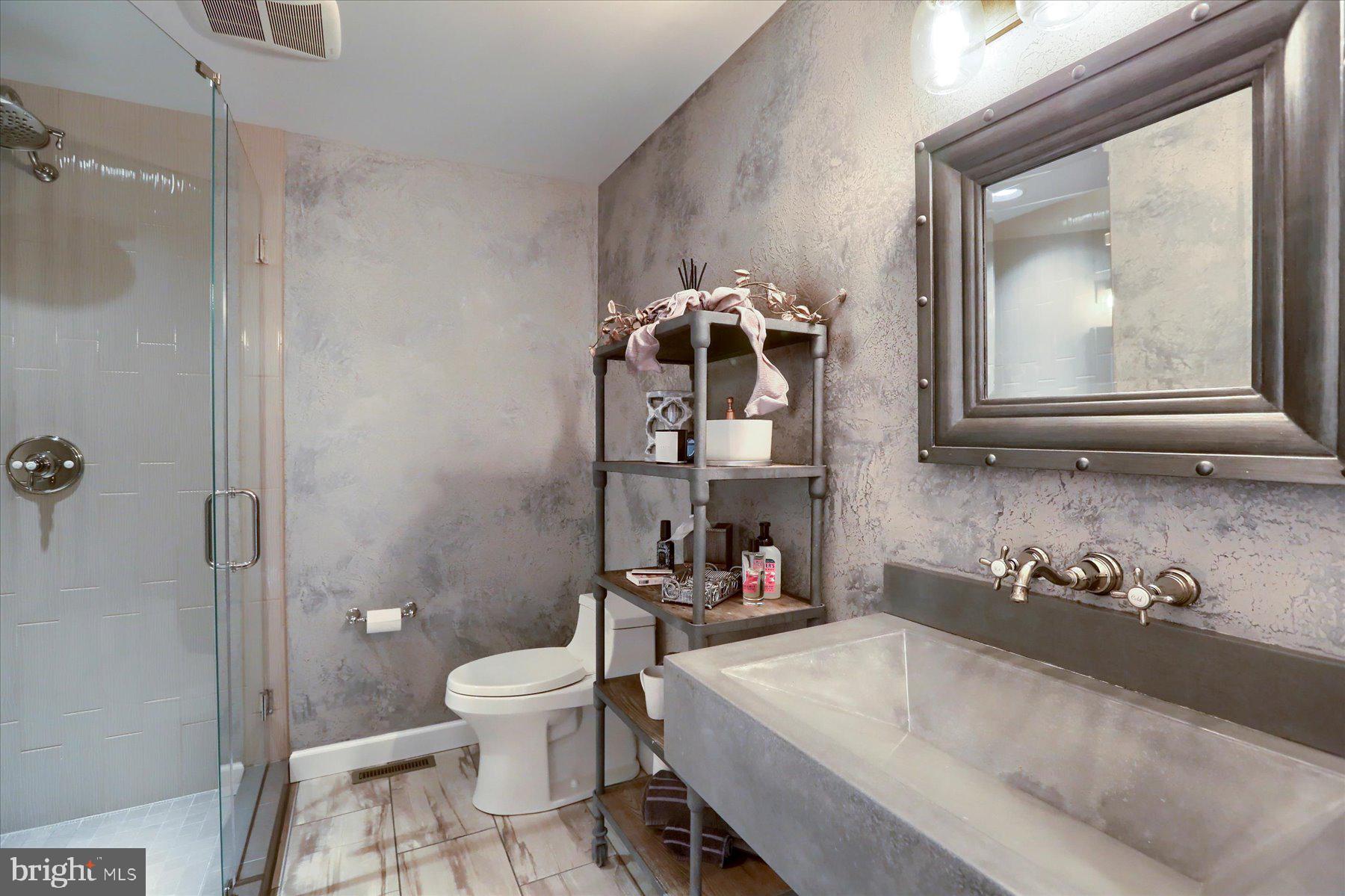 503 Maple Avenue Hershey, PA 17033 - Photo 27 of 43 a bathroom with a sink a toilet and shower