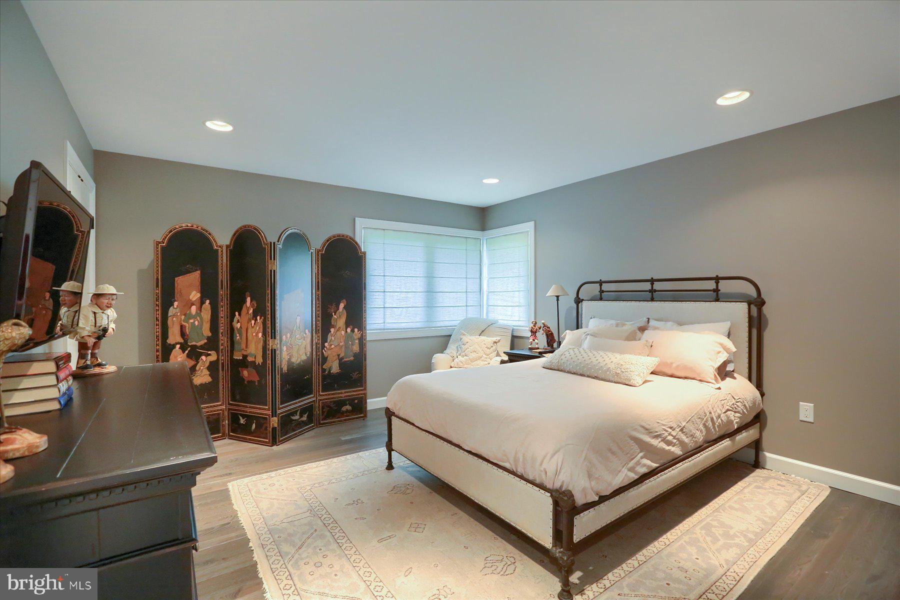 503 Maple Avenue Hershey, PA 17033 - Photo 29 of 43 a bedroom with a bed and lamp