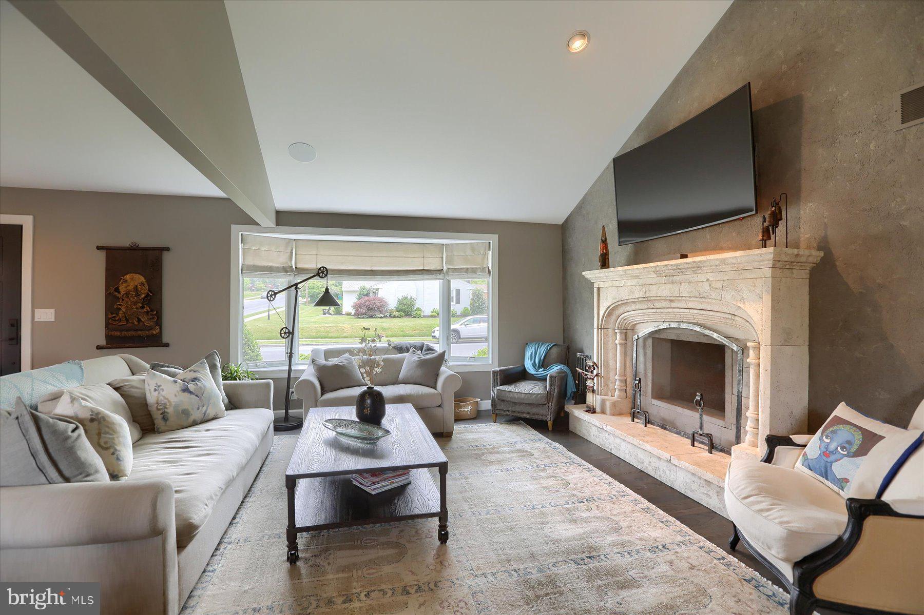 503 Maple Avenue Hershey, PA 17033 - Photo 3 of 43 a living room with furniture fireplace and a flat screen tv
